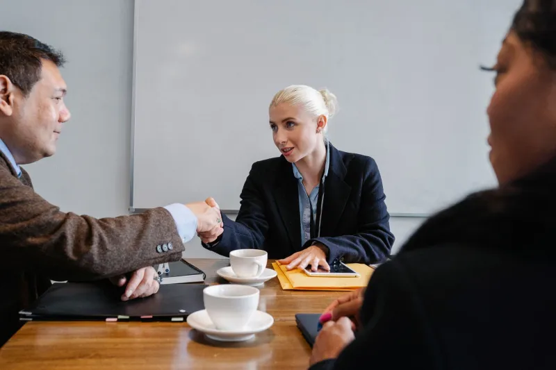 The Closed Door and the Handshake: When Your Career Moved Forward in a Room With Two People